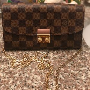 Louis Vuitton Felicie pochette in Damier Ebene.